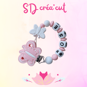 Attache-tétine en silicone Papillon Rose et Blanc