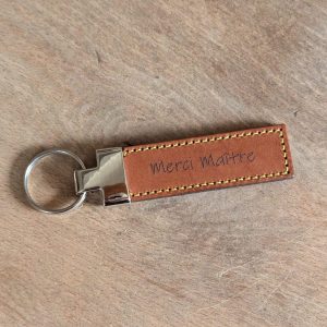 Porte-clés en cuir rectangle – Merci maître
