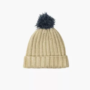 Bonnet Barry en tricot crème avec pompon bleu denim